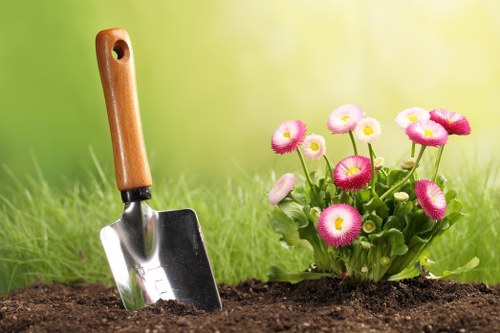 Booking and service agreement details for a UK gardening company